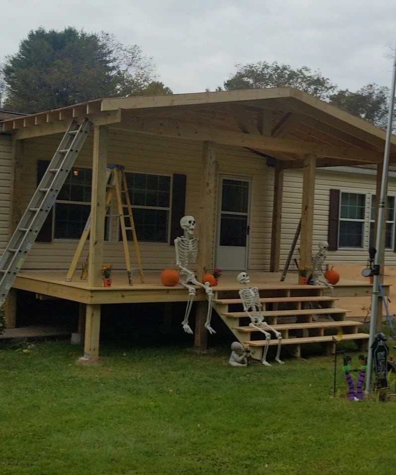 deck installation in front of a utica ny house